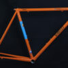 Delirio - Orange and blue - Lugged road bike frame - Custom bicycle frame painting services - Custom steel bicycle frames for road, adventure, gravel, track/pista, and more.
